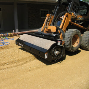 Roller for skid steer